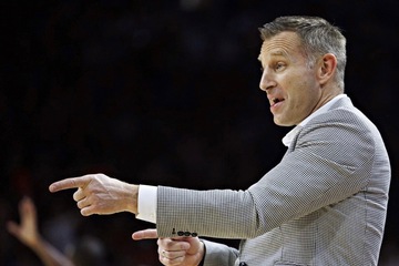 Alabama basketball coach Nate Oats slam dunks to the bank with whopping extention