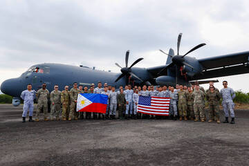 Philippines and US test air defenses as China seizes disputed reef