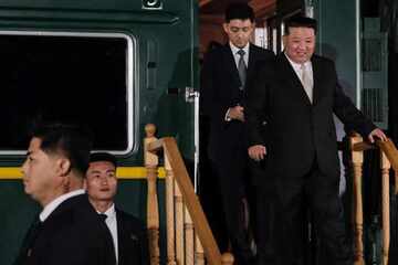 North Korea's Kim Jong Un passes into China on the way to major military parade