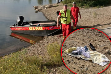 Dresden: Frau an Dresdner Kiesgrube verunglückt? Retter suchen mit Spezialgeräten im Wasser