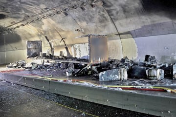 Staus nach Tunnelbrand: Züge und Autofahrer stecken fest
