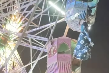 Riesenrad-Drama: Frau baumelt meterhoch in der Luft und kann sich kaum halten