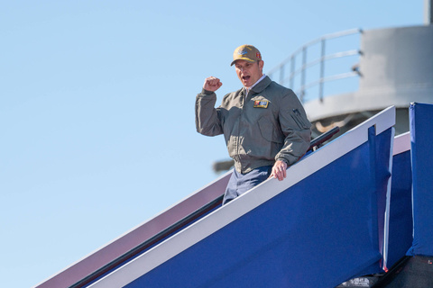 Hegseth dons fatigues and assault rifle during 