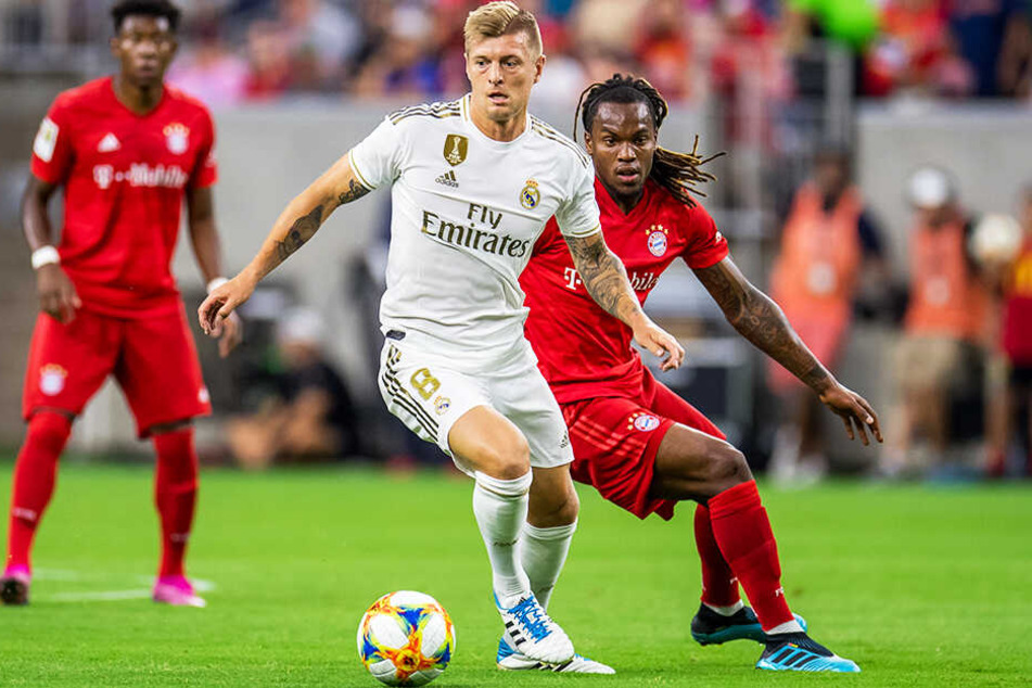 Toni Kroos gegen Bayerns Renato Sanches im Testspiel in Houston. Auch der deutsche Nationalspieler steht in der Kritik.