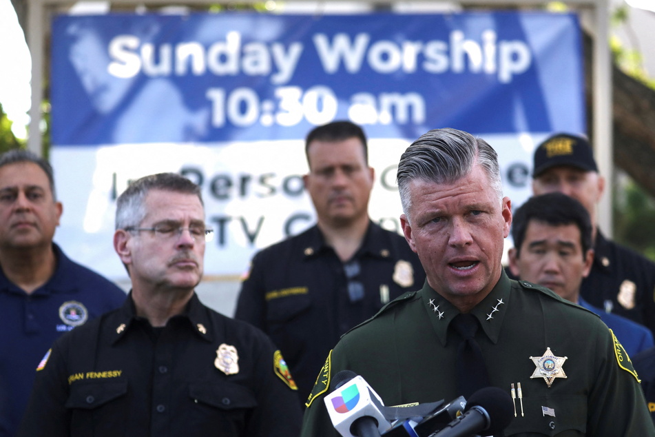 Jeff Hallock, Orange County Sheriff's Department undersheriff, speaks to the media after a deadly shooting at Geneva Presbyterian Church in Laguna Woods.