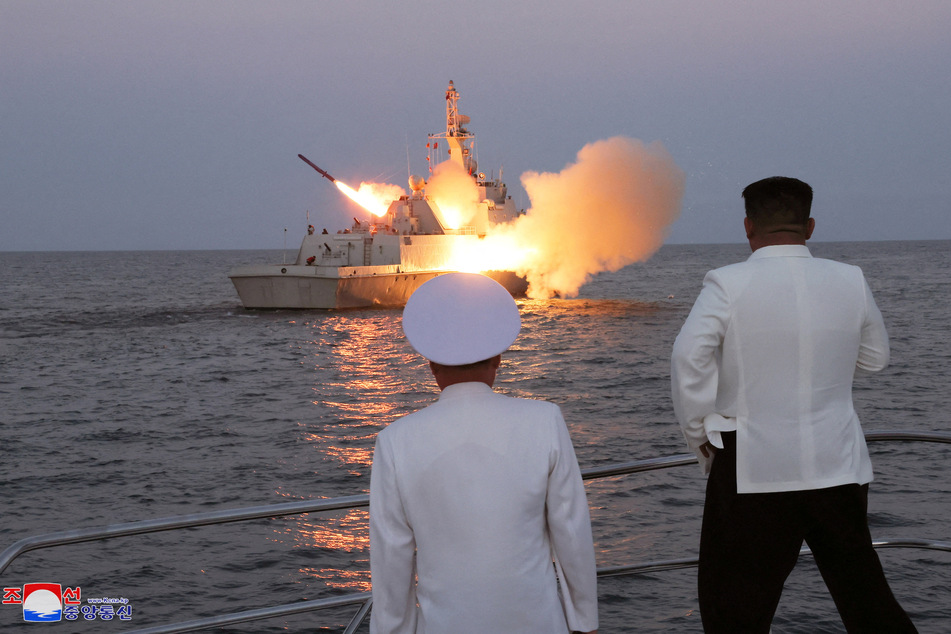 North Korean leader Kim Jong Un oversees a strategic cruise missile test aboard a navy warship in this undated photo released by North Korea's Korean Central News Agency on August 21, 2023.