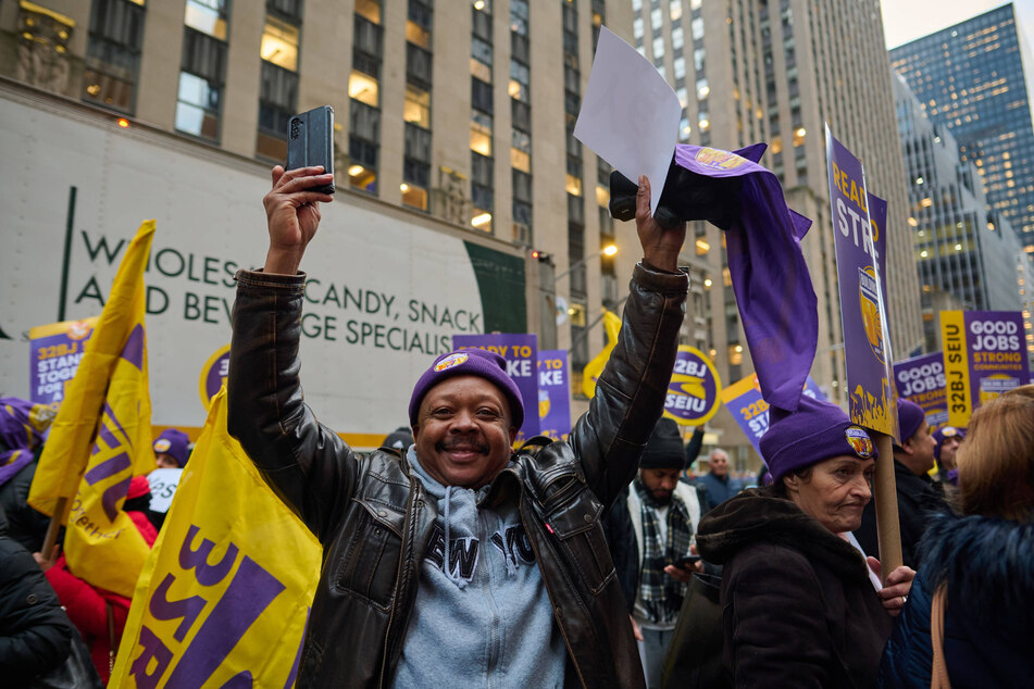 Members of the 32BJ union rally to authorize a strike of 20,000 commercial cleaners across the city on December 20, 2023.