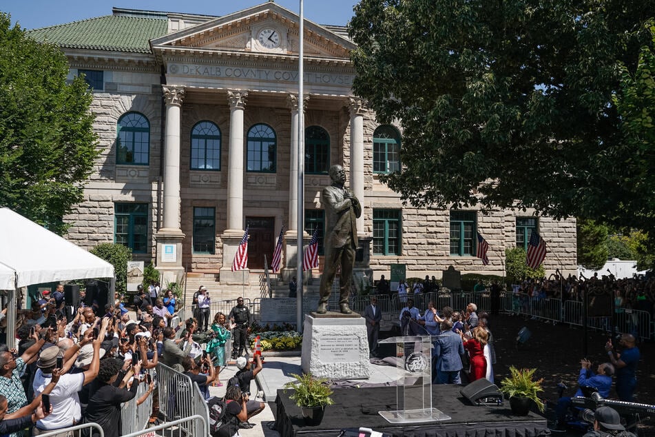 A statue of former Congressman and Civil Rights leader John Lewis is unveiled on August 24, 2024, in Decatur, Georgia, replacing a Confederate monument that was removed in 2020.