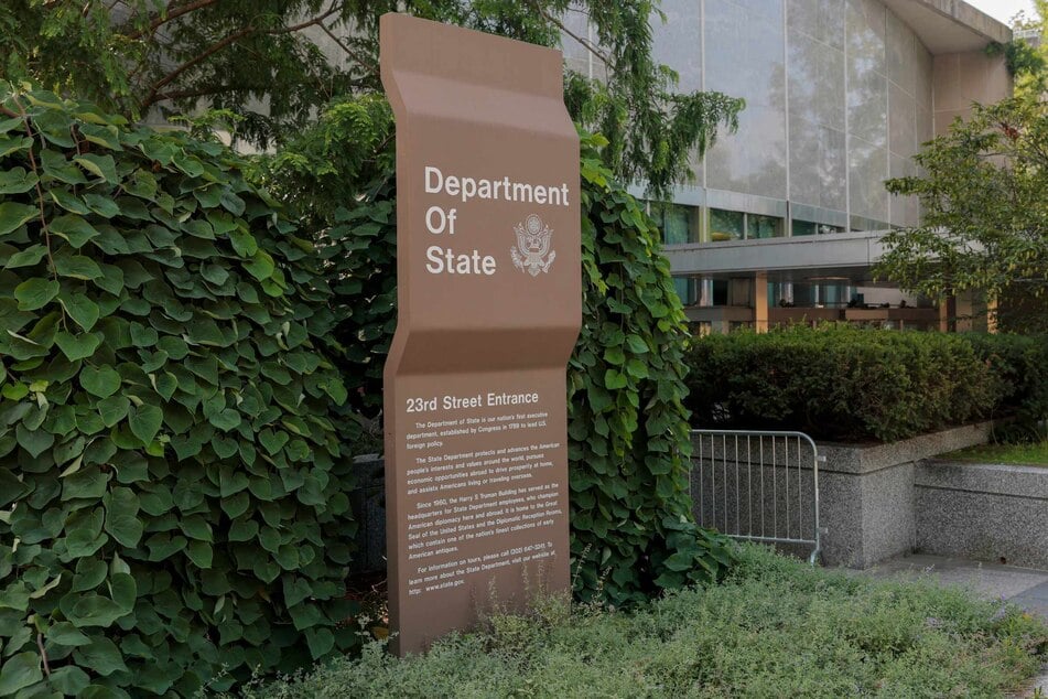 A sign for the US Department of State is seen on the outside of the Harry S. Truman Federal Building on on July 11, 2025 in Washington, DC.