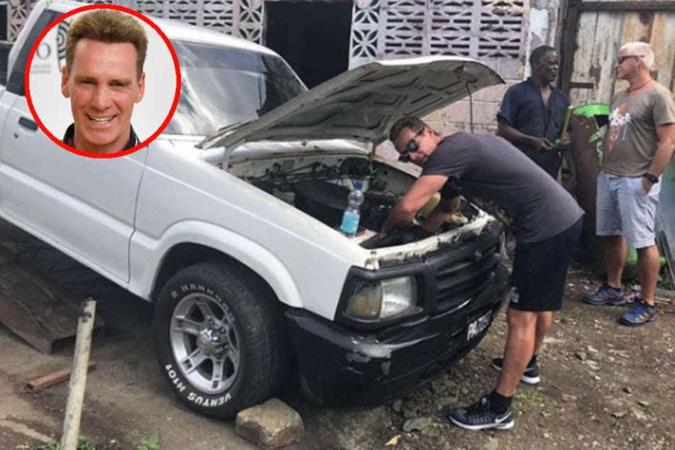 Fachmännisch macht sich Jürgen am Geländewagen zu schaffen.