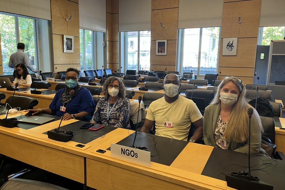 PIPES President Dr. Creighlynn Thoele (r.) and Executive Director Terrance Winn (second to r.) prepare to deliver remarks at the Palais Wilson in Geneva, Switzerland.