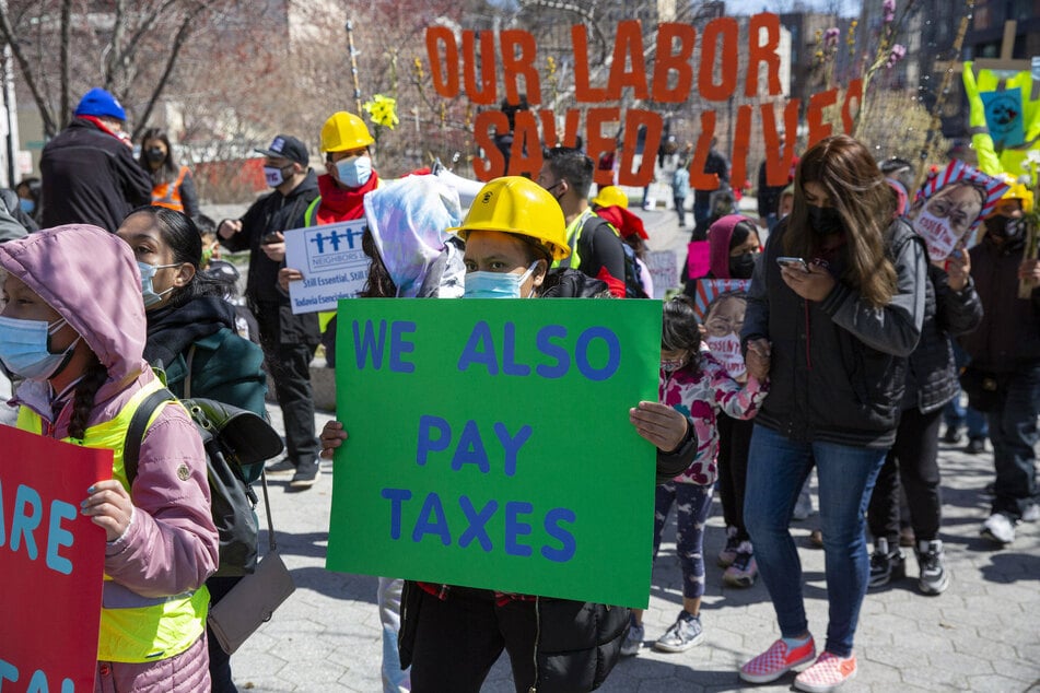 Protesters took to the streets in New York to demand coronavirus relief funds for excluded workers.