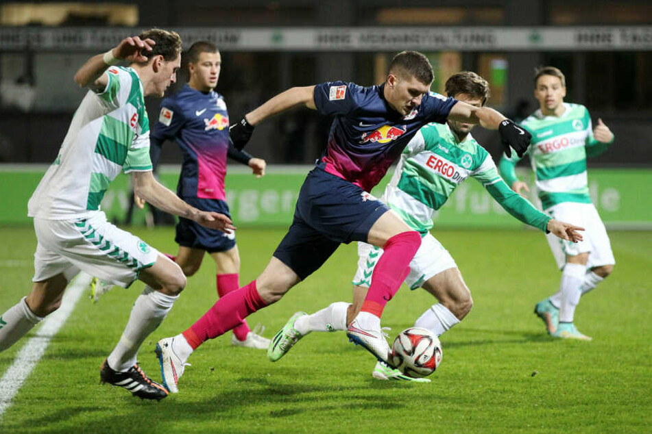 Ante Rebic (M.) spielte zur Leihe in der Saison 2014/15 in Leipzig, kam in elf Einsätzen aber zu keiner Torbeteiligung. Samstag folgt die Rückkehr.