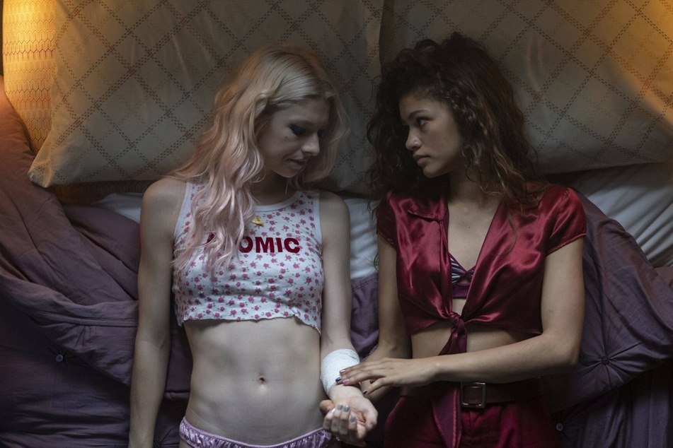 Zendaya (r.) and Hunter Schafer (l.) star as Rue and Jules, two high school teens with a complicated relationship in the HBO Max series, Euphoria.