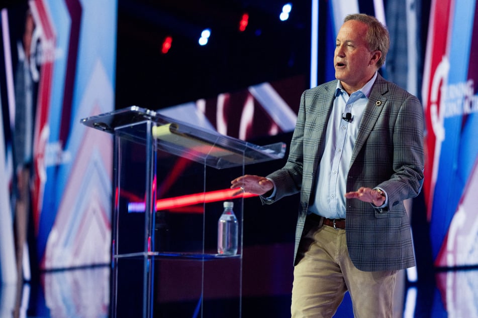 Texas Attorney General and US Senate candidate Ken Paxton speaks at the Turning Point USA summit in Phoenix, Arizona, on December 20, 2025.