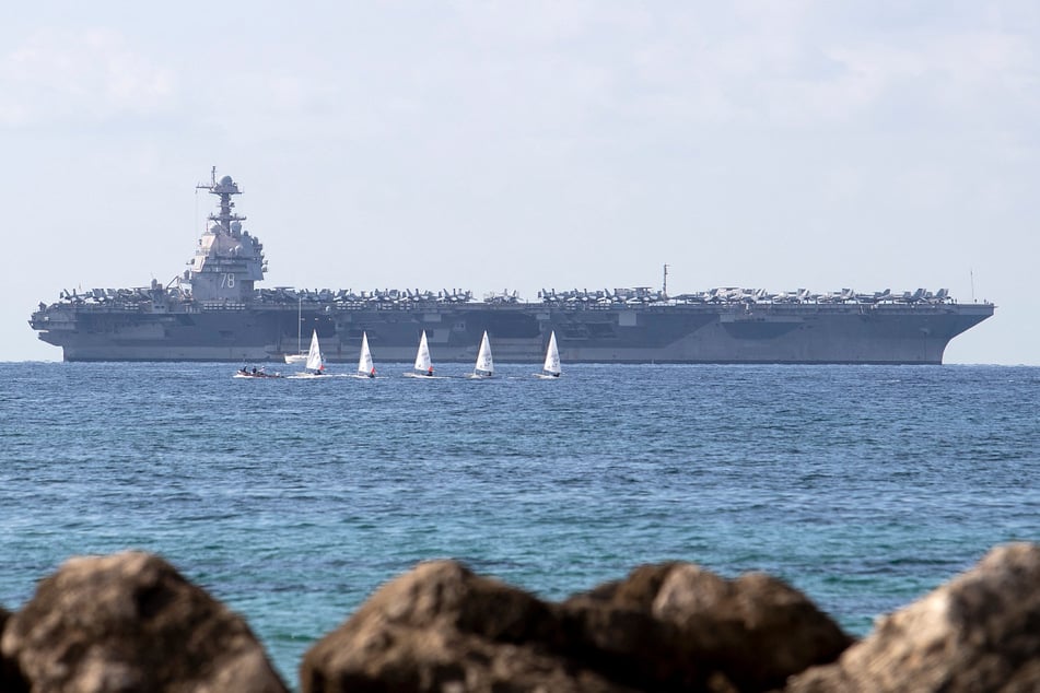 The USS Gerald Ford has arrived in the Latin America region, three weeks after its deployment was ordered.