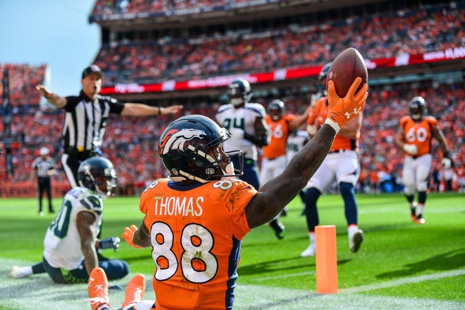Denver Broncos'Demaryius Thomas makes a one-handed catch on the edge of the end zone against the Seattle Seahawks.