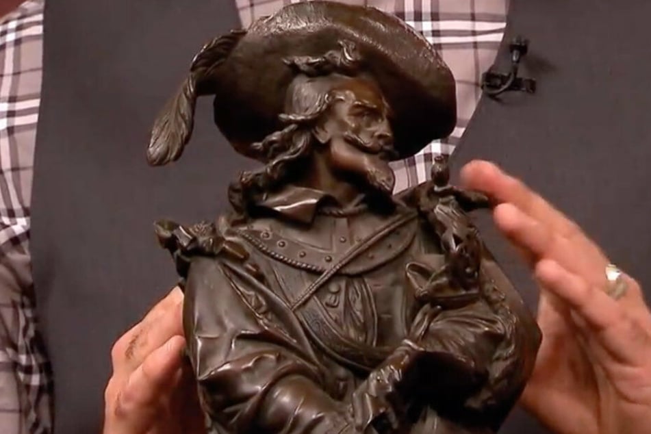 Der bronzene Musketier beglückt die Geldbörse seiner Besitzerin.