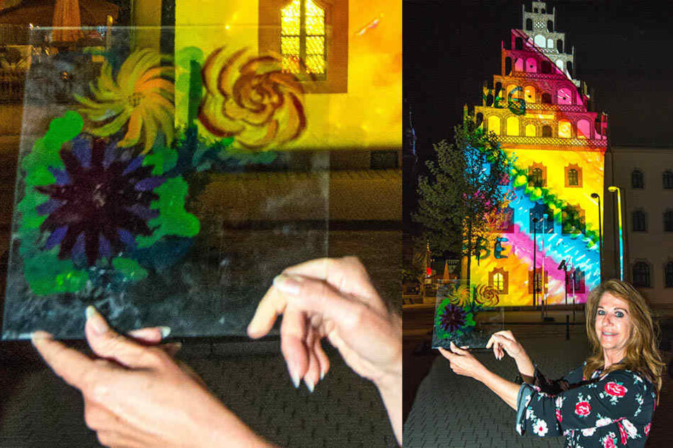 Festival-Chefin Birgit Zahnder (56) lässt Besucher Glas-Dias bemalen, deren Motive Minuten später auf der Fassade des Dünnebierhauses strahlen.