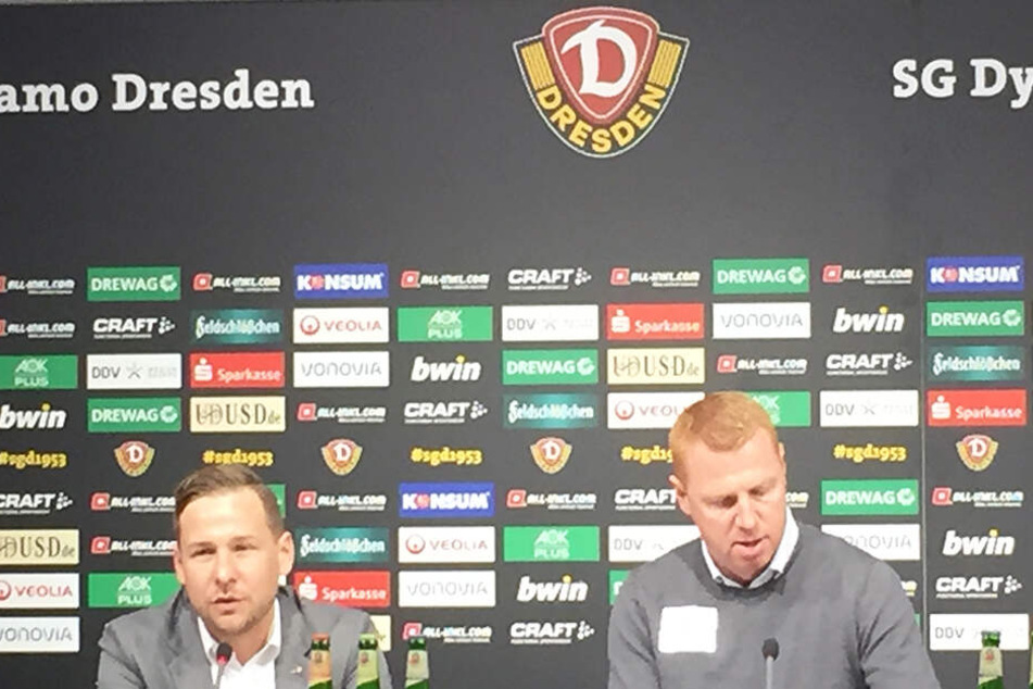SGD-Chefcoach Maik Walpurgis (rechts) spricht auf der PK zu den Journalisten. Links Pressesprecher Henry Buschmann.
