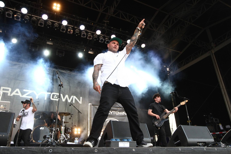 Despite being labeled a "one-hit wonder," Crazy Town has continued touring and playing music, but recently, troubles have arisen.