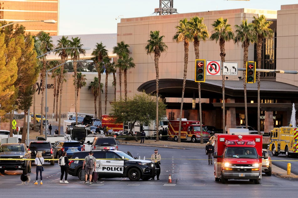 A Las Vegas Metropolitan Police Department vehicle blocks the road near the Trump International Hotel &amp; Tower Las Vegas after a Tesla Cybertruck exploded in front of the entrance on Wednesday.