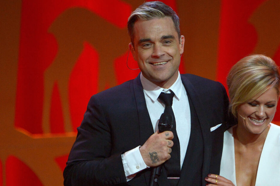 Kennen sich seit zehn Jahren: Robbie Williams (45) und Helene Fischer (35).