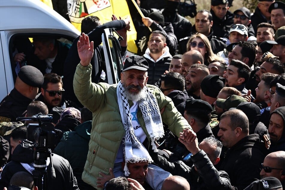 Another freed Palestinian prisoner is greeted by friends and relatives upon arrival in Ramallah on February 15, 2025.