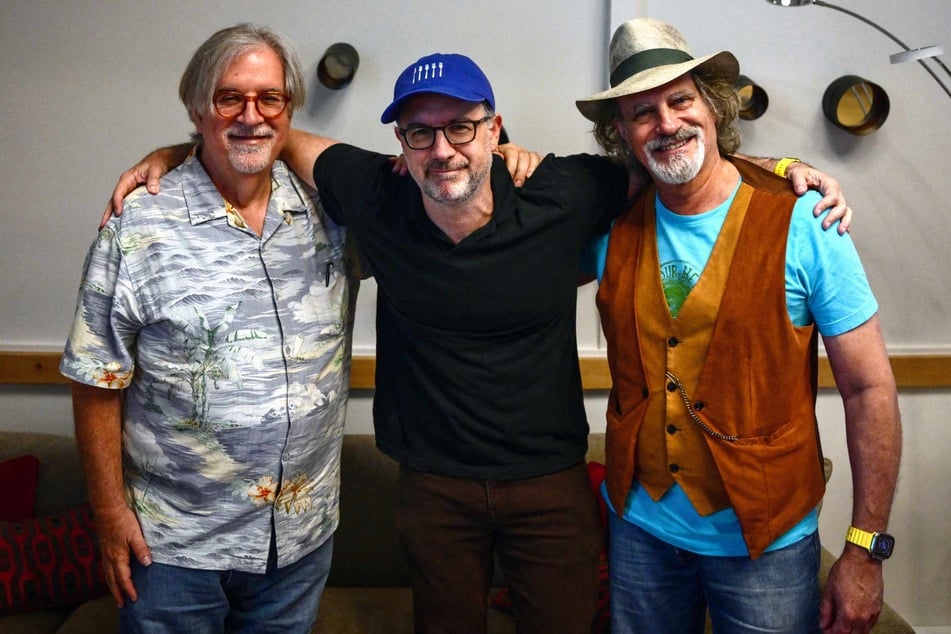 Cartoonist and creator of the TV series The Simpsons Matt Groening (L), screenwriter Matt Selman (C), and producer and director David Silverman (R) pose during a photo session on the sidelines of the 49th Annecy International Film Festival in Annecy on Wednesday.