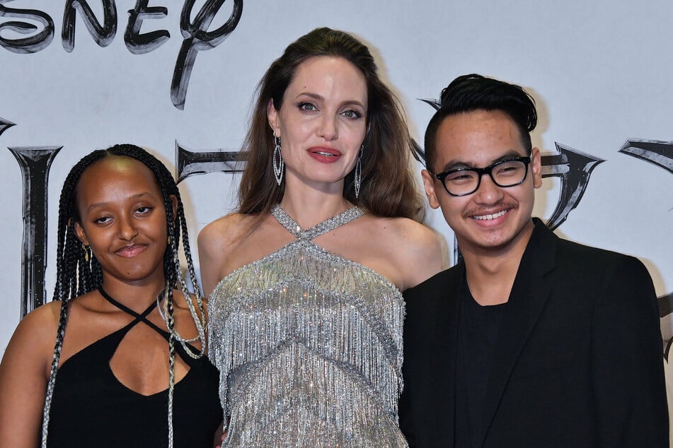 Angelina Jolie with her two eldest children, Zahara Marley (l.) and Maddox Jolie-Pitt.
