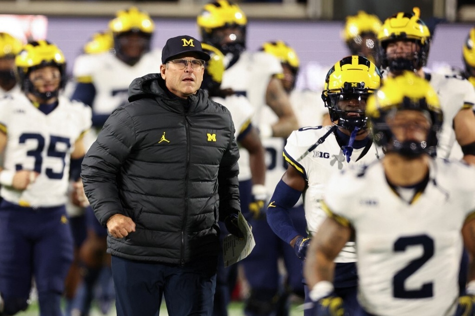 If Michigan secures a spot in the Big Ten Championships, Jim Harbaugh would regain eligibility to resume coaching on the sidelines.