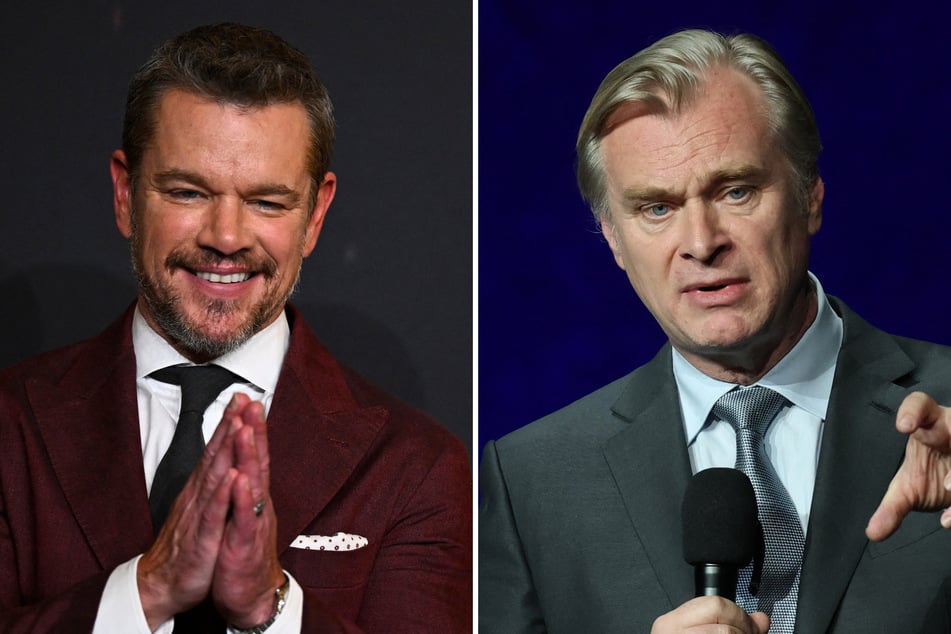 Director Christopher Nolan (r) revealed some juicy details about Matt Damon's (l) arm tattoo.