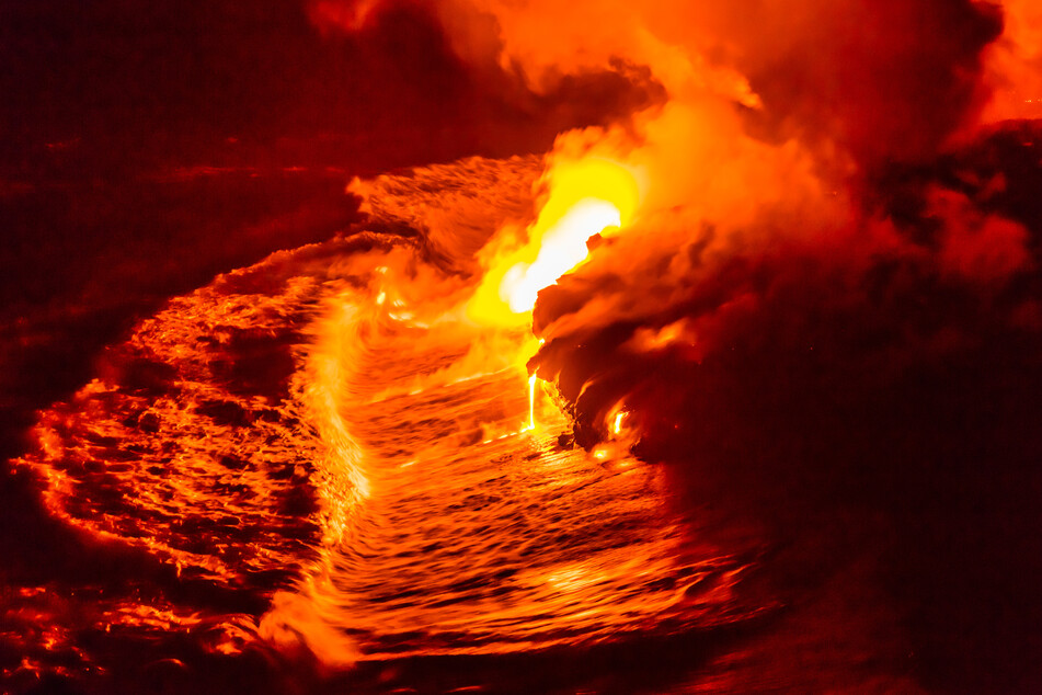 Lava flows into the ocean from Kilauea in a previous eruption.