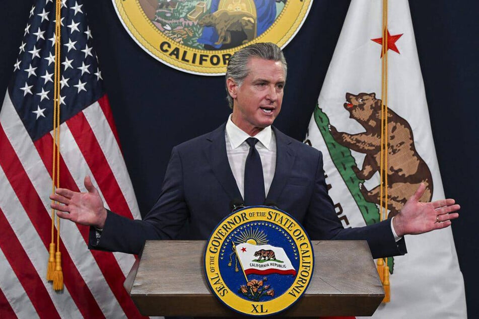 California Governor Gavin Newsom (pictured) eviscerated President Donald Trump's economic record during the launch of his revised budget on Thursday.
