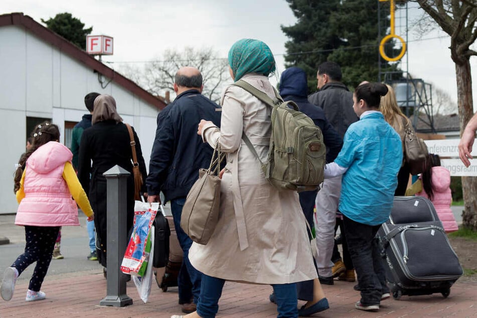 Syrische Flüchtlinge kommen in das Grenzdurchgangslager Friedland.