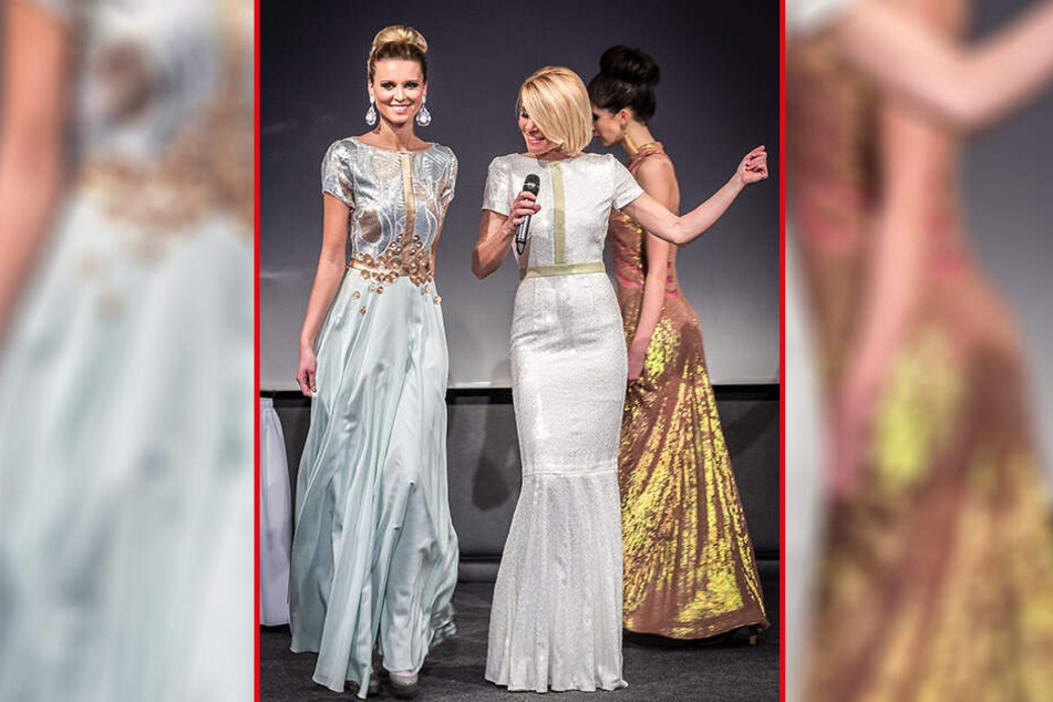 Model Katja Kühne (33) führt bei einer "Weißen Nacht" auf Schloss Wackerbarth ein Kleid aus der "Zingarelli"-Kollektion vor.