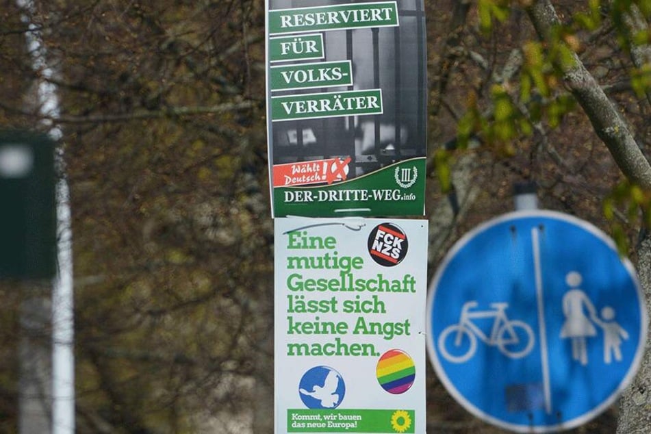 Die Europawahlplakate der rechtsextremen Partei "Der III. Weg" sorgen in Chemnitz für Aufruhr - direkt darunter der krasse Kontrast: Ein Wahlplakat der Grünen.