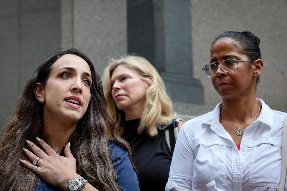 Sexual assault survivors speak to members of the press following the sentencing of former gynecologist Robert Hadden, outside the Manhattan federal court in New York City.