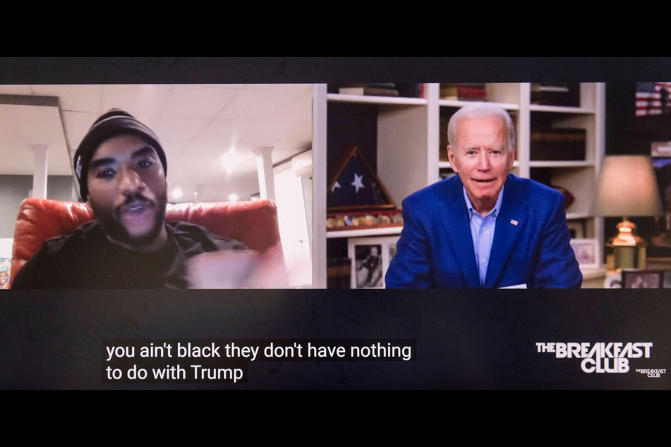 Joe Biden (r.) appeared on the radio show The Breakfast Club, during which he infamously implied to host Charlamagne tha God that Black people who didn't vote for him "ain't Black."