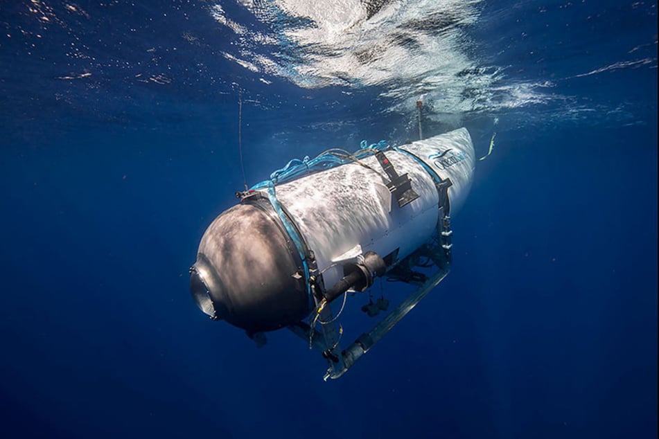 This undated image, courtesy of OceanGate Expeditions, shows their Titan submersible beginning a descent.