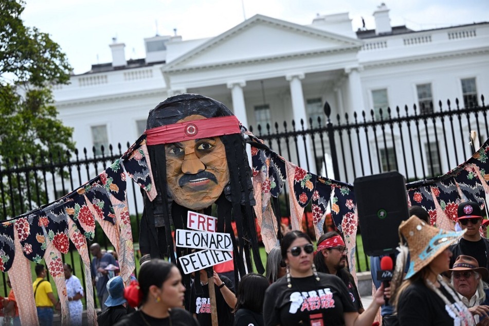 Indigenous activists and allies rally in front of the White House to demand Leonard Peltier's release from prison.