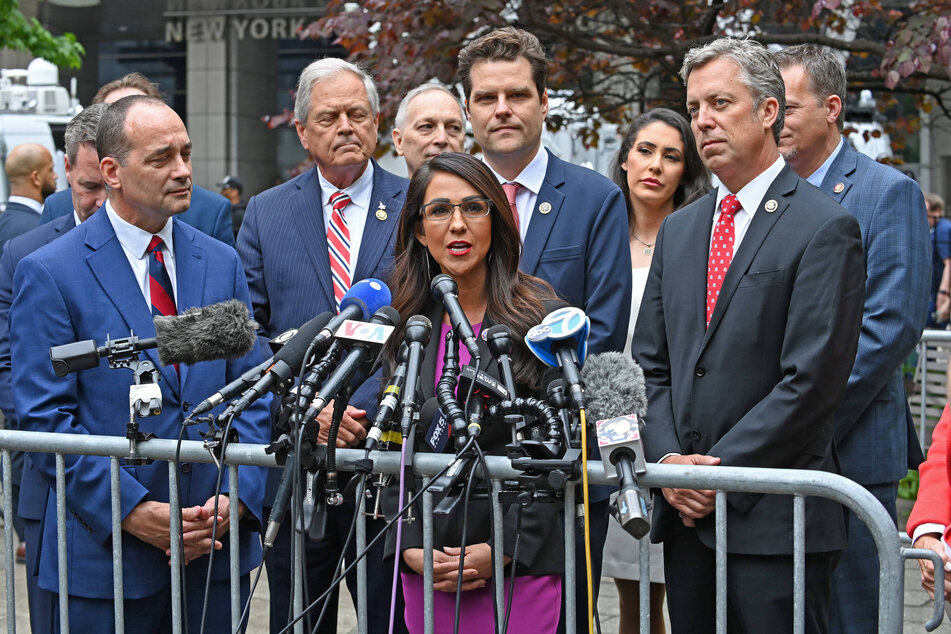 Rep. Lauren Boebert (c.) and other MAGA Republicans giving a press conference outside Donald Trump's hush money trial in New York City on May 16, 2024.