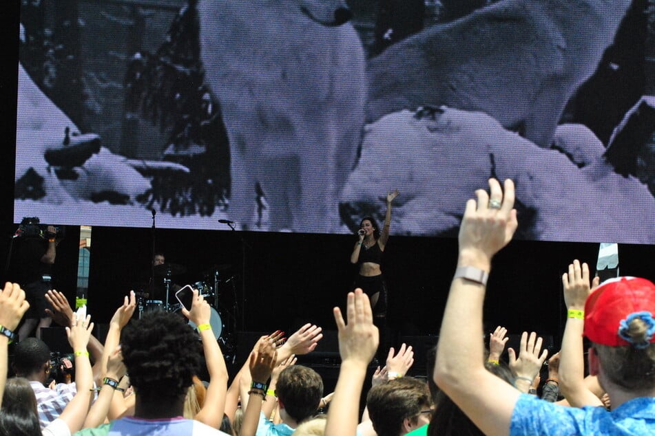 Fans threw their hands in the air during Julia Wolf's set on Day 1.