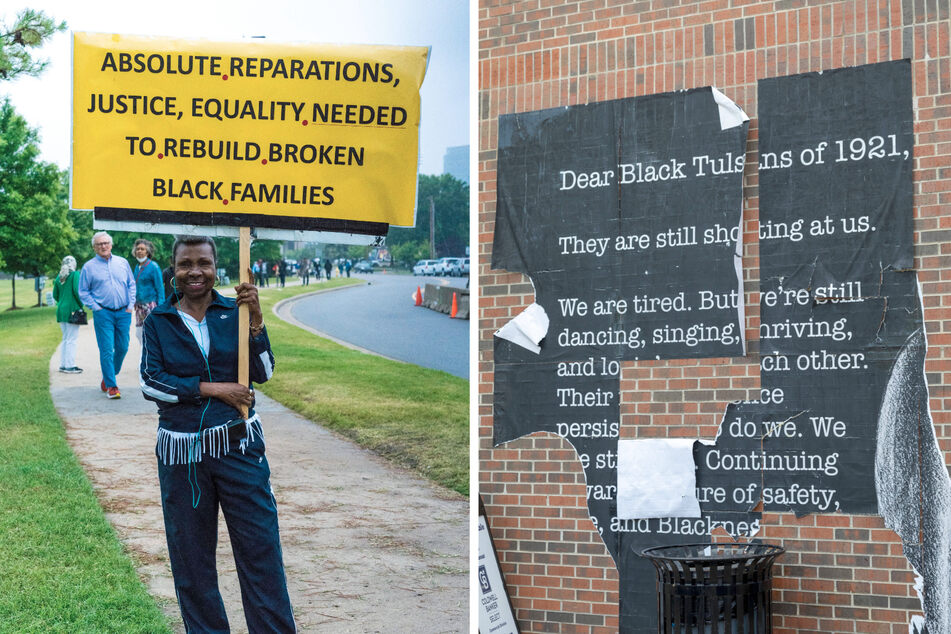 A demonstrator calls for reparations while marching on the 100th anniversary of the Tulsa Race Massacre.