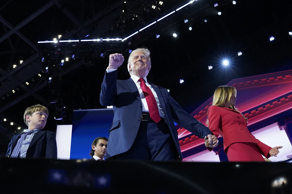 GOP presidential nominee Donald Trump is joined on stage by wife Melania and other relatives after giving his acceptance speech on Day 4 of the Republican National Convention.