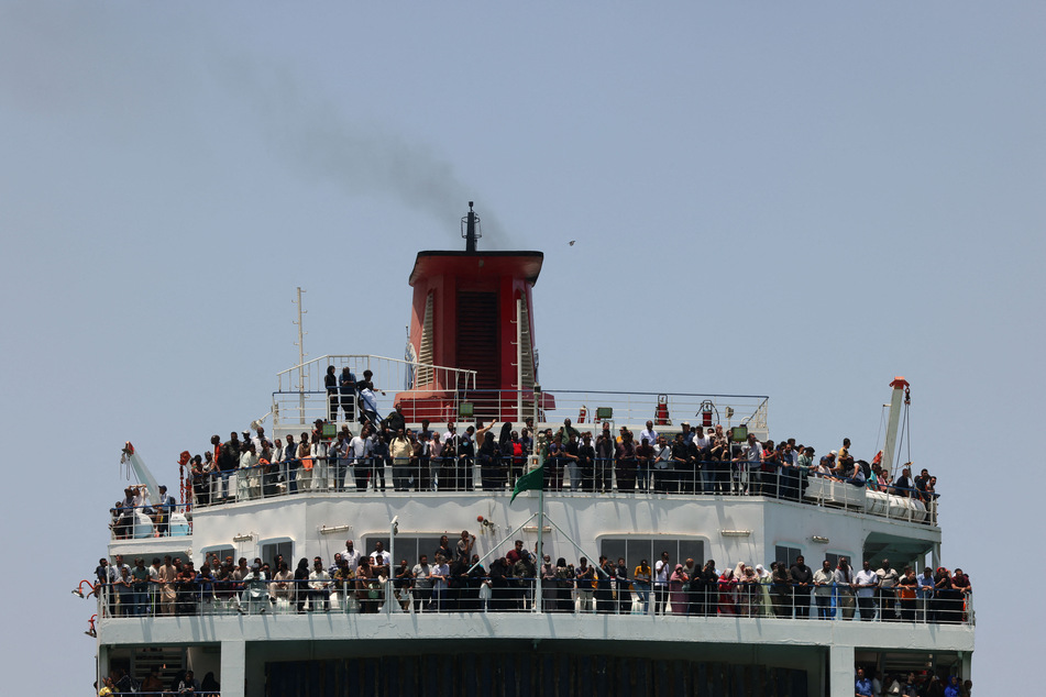 Evacuees reached the port city of Port Sudan, from where they fled the conflict to Saudi Arabia.