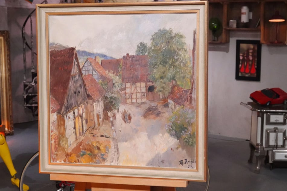 Das impressionistische Gemälde von Theodor Rudolf Rocholl (1854–1933) entstand 1923 und zeigt ein idyllisches "Fachwerkdörfchen".