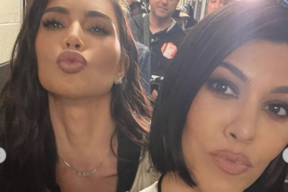 Kourtney (r) and Kim Kardashian's alleged feud may be over, as the siblings have been spending a lot of time together recently.