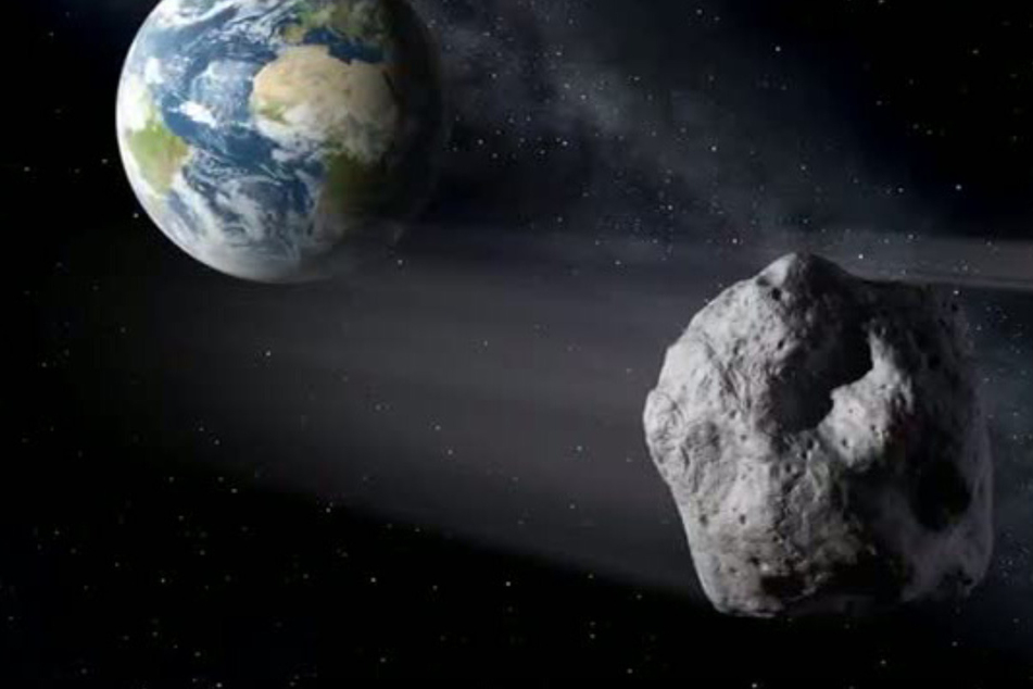 Die grafische Darstellung zeigt einen Asteroiden (re.) beim Vorbeiflug an der Erde. Asteroiden rasen sehr häufig an der Erde vorbei - meist aber in recht großem Abstand. Näher kommt unserem Planeten Anfang September der Asteroid "2011 ES4".