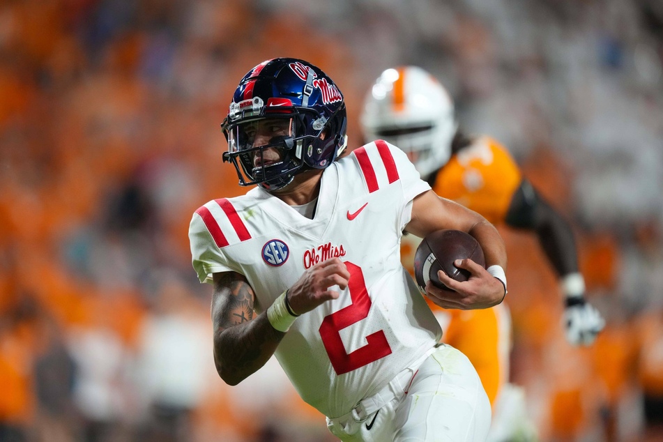 Ole Miss Rebels quarterback Matt Corral makes a play during a game against the Tennessee Volunteers on October 21.